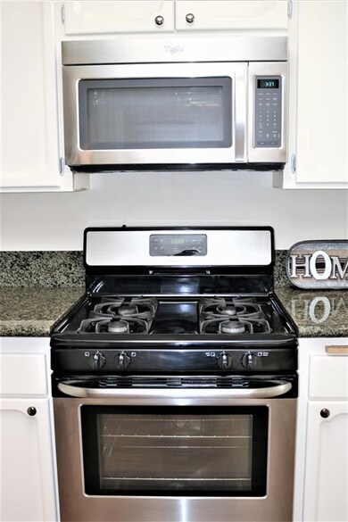 stainless gas stove and microwave oven