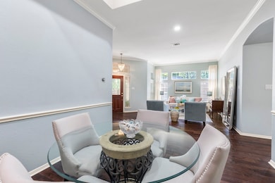 The formal dining room and living room are filled