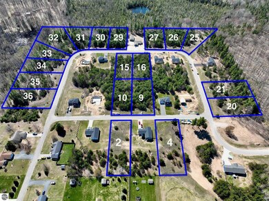 6387 Jeffrey Place unit Lot 32, Grawn, MI 49637 - photo 2