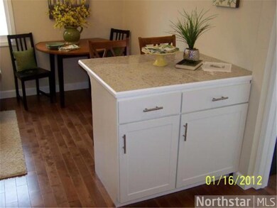 Remodeled kitchen with new cabinets and granite co