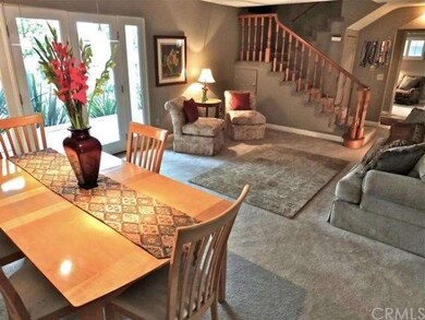 Charming living room and dining room out to porch