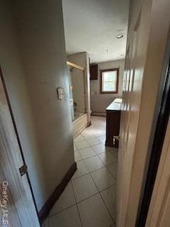 Bathroom featuring vanity and light tile patterned floors
