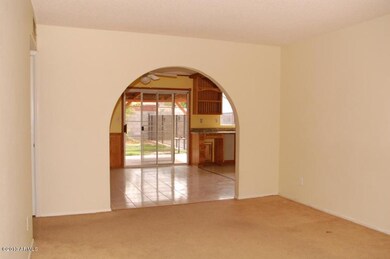 living room into kitchen