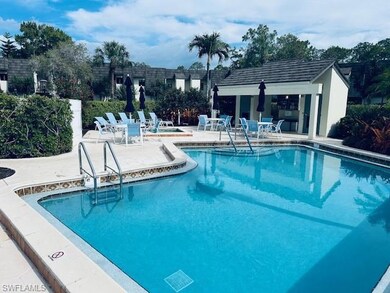 Community pool featuring a patio