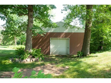 Front view of pole barn. Building is metal with a 