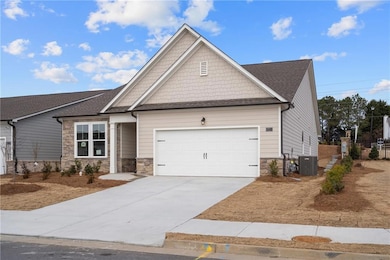 Craftsman inspired home with a garage and central 