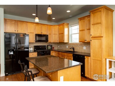 granite and real wood cabinets