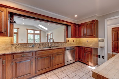 Kitchen with pass through to the Great Room