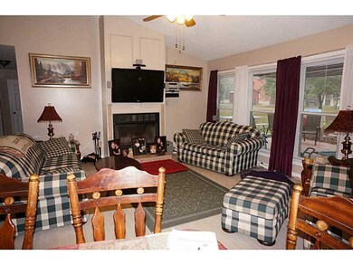 Living Room. Formal living has windows across back