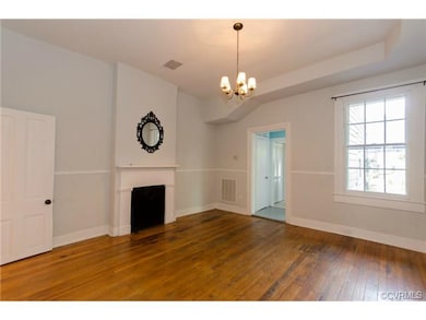 Dining Room.  Powder Room Access in the Left Corne