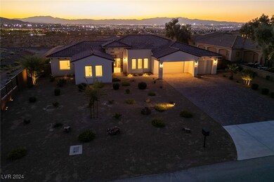 EVENING FRONT AERIAL VIEW