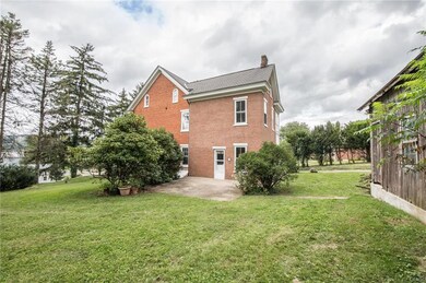 Flat land adjacent to side of house