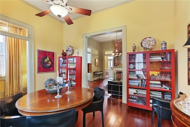 Dining room with refinished wood floors.