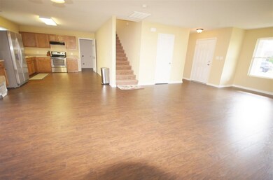 The Family Room is very Large, new hardwood floors, new paint, new stainless steel appliance package,  an open concept that allows you entertain and spend quality time with family and friends!