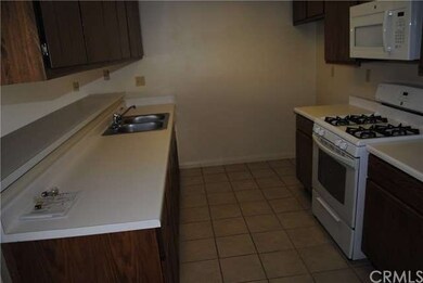 Kitchen with refurbished cabinets.