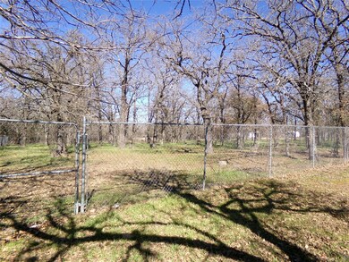 Chain-link fence around entire back of property.