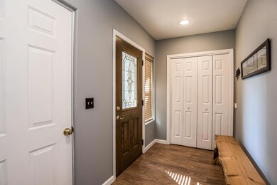 Entry Way, closet, garage access