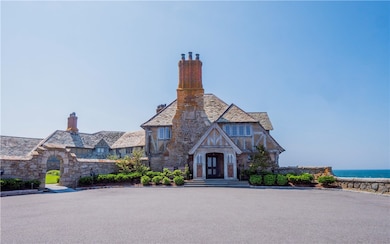 Front & Circular Parking area & Stone Arched Entry