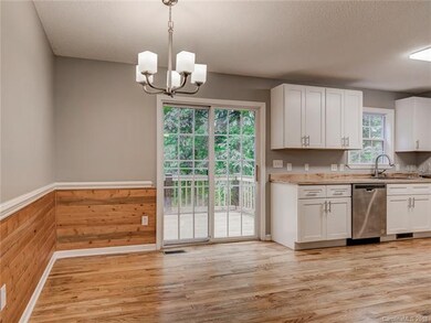 Open dining leading to private deck.