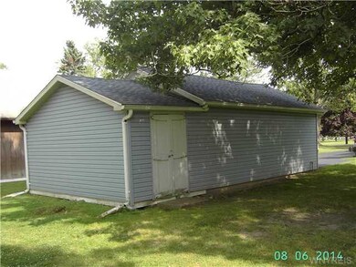 Garage with a Storage Shed in the rear