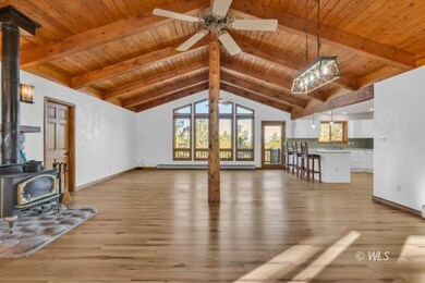 Spacious great room with wood stove