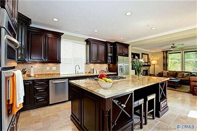 Kitchen is open to adjacent family room