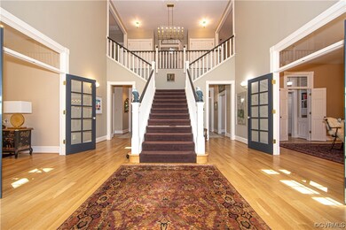 Dramatic foyer with 20' high soaring ceiling!