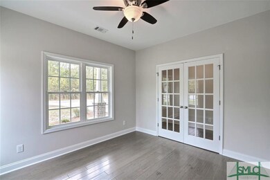 Study- Cased out windows, French Doors, and Beauti