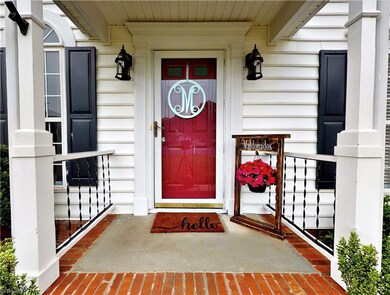Cheerful and welcoming front porch!