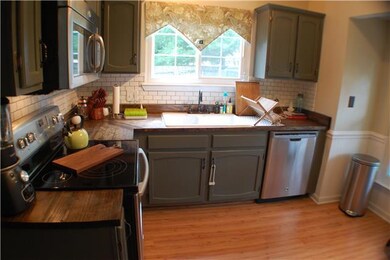 Kitchen has brand new appliances, new counters, ne