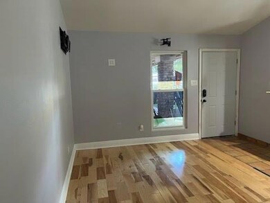 Foyer entrance featuring light wood-style floorin