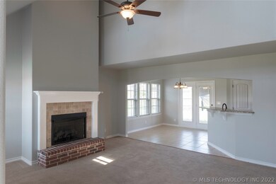 Entry View with Vaulted Ceiling and Fireplace!