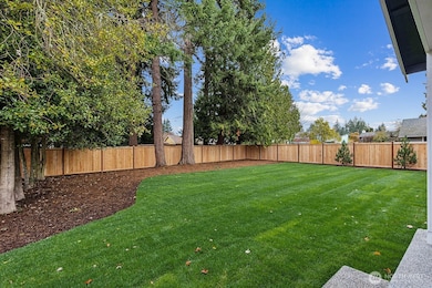 Huge Flat & Fenced Backyard Offers Privacy and Space to Play