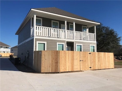View of front facade featuring a balcony, fence, a