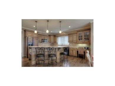 Kitchen island and built in desk. Kitchen does hav
