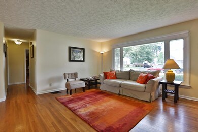 Big Picture Window & Hardwood Floors
