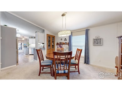 Formal dining area with built-ins and updated lighting