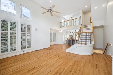 Soaring 22-foot ceilings, floor-to-ceiling windows