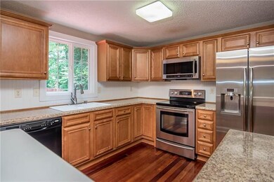 Granite counter tops and plenty of storage space i
