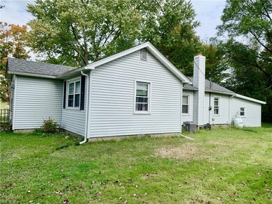 Right side of home opposite of driveway