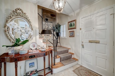 Left unit: Another view of the foyer.