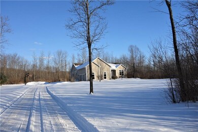 Set far off the road and situated on almost 3 acre