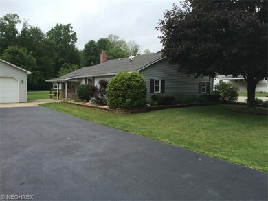 View from street. Beautiful landscaping.