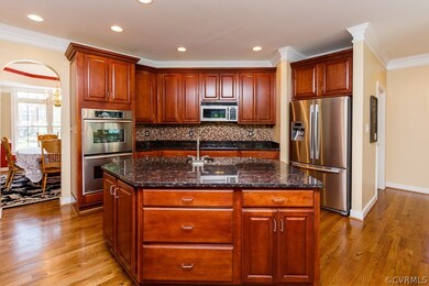 Enormous island with cabinetry and a vegetable sin