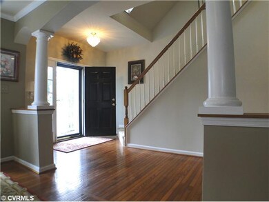 Foyer - Two Story Foyer Features Open Staircase, W