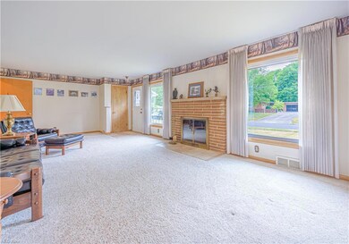 Large living room with two huge windows
