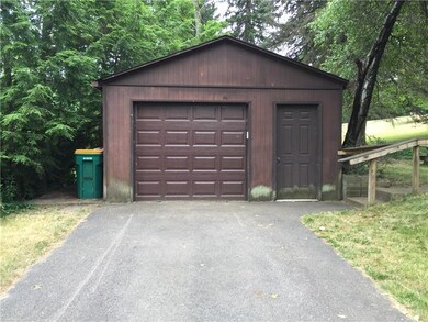 2 Car Deep Garage with work bench and plenty of st