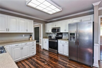 Kitchen with plenty of counter space.   Located ju