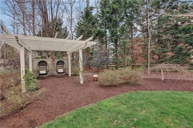2nd pergola with swinging chairs.