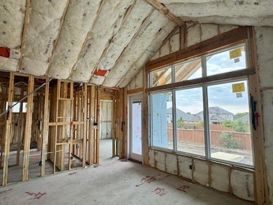 Misc room featuring vaulted ceiling